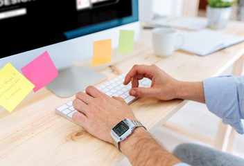 Young modern man working in the office