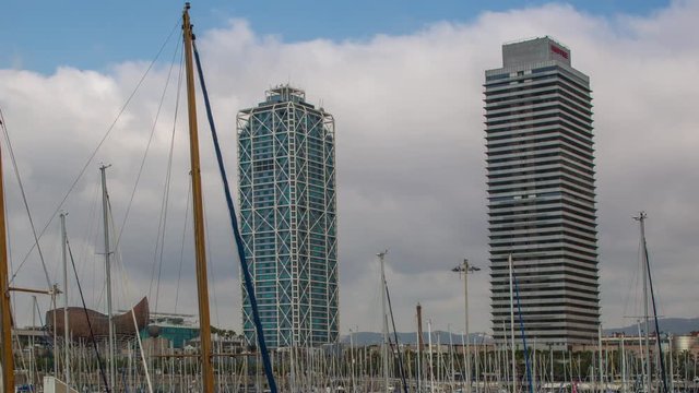 timelapse of the boats and twin towers in Port Olympic, Barcelona