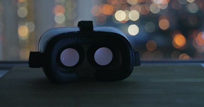 Virtual reality playing movie inside at night