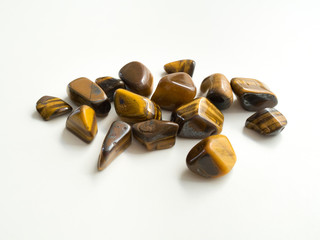 Tumbled Eye of the tiger stones for crystal therapy treatments and reiki