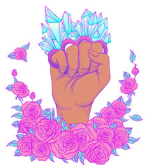 Fight like a girl. Woman's hand with crystal quartz brass knuckles. Fist raised up. Girl Power. Feminism concept.