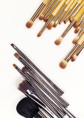 Many different brushes for make-up on white