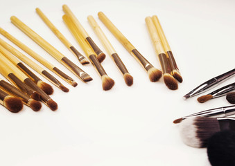 Many different brushes for make-up on white