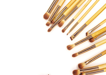 Many different brushes for make-up on white