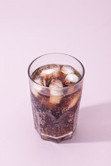 Cola and ice cubes in a glass