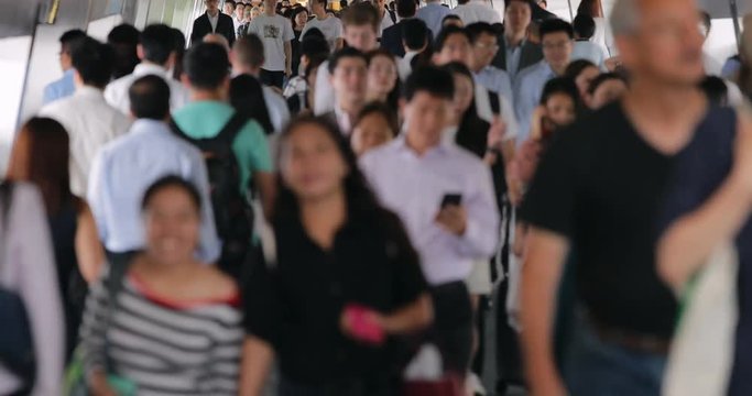 Central, Hong Kong, 19 July 2017:- Hong Kong People walking in the pedestrian bridge