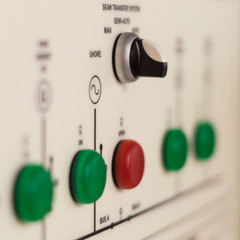 Main electric control board inside a factory (blurred picture)