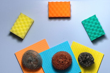 Sponges, metal sponges and cleaning napkins