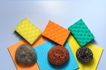 Sponges, metal sponges and cleaning napkins