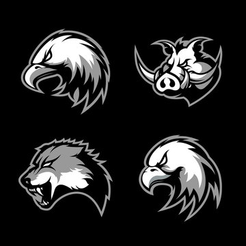 Furious boar, wolf, panther and eagle head sport vector logo concept set isolated on black background.