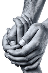 Concept of salvation. Men's hands hold the female palm on isolated, white background.