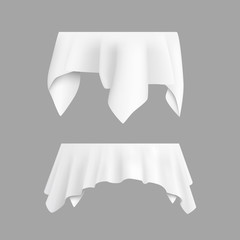 Two white round with table tablecloth