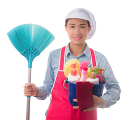 happy woman holding a bucket full of cleaning supplies isolated on white background
