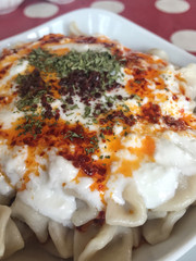 Turkish ravioli served with natural yogurt