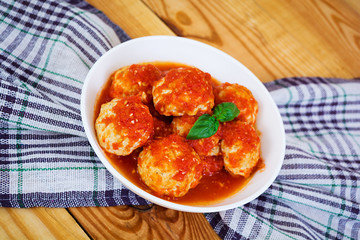 Meatballs on wooden background