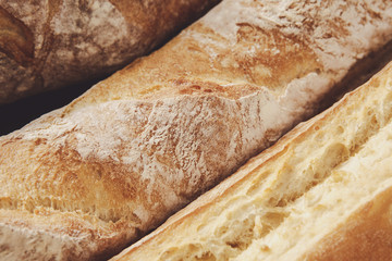 Bread texture background, closeup of baguette loaf