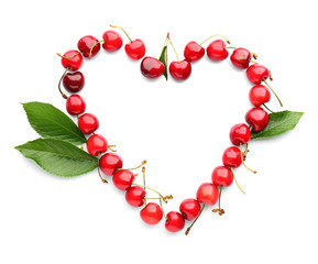 Heart made of fresh cherries on white background