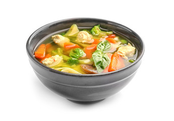 Bowl with delicious turkey soup, isolated on white
