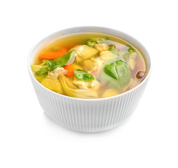 Bowl with delicious turkey soup, isolated on white