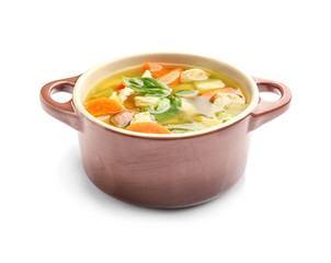 Casserole with delicious turkey soup, isolated on white