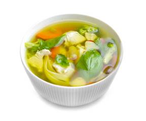 Bowl with delicious turkey soup on white background