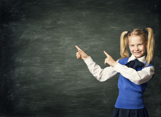 Child School Girl Pointing Blackboard, Kid Student over Black Board Background in Classroom