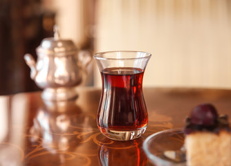 Turkish tea in traditional glass on table