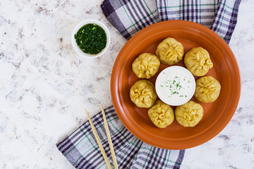 Delicious manti dumplings on white background