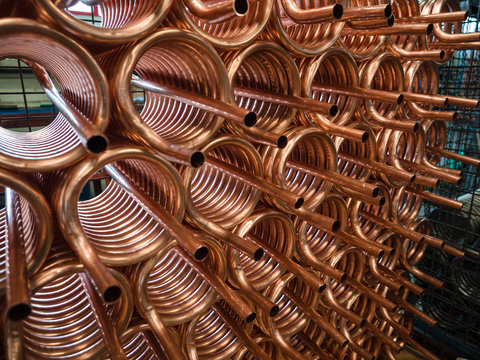 Heat exchangers obtained by wrapping copper tube.