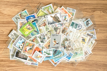 Fototapeta na wymiar A set of postage stamps printed from different countries.