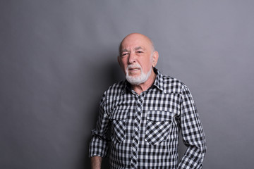 Obraz premium Mature man expressing disgust, grimacing