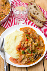 Hungarian meat stew Porkolt with veal and sweet pepper