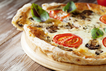 Homemade cheesy vegetable quiche pie