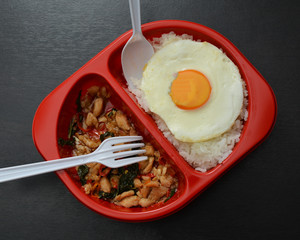 Instant food in red packed on table