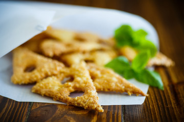 Home cheese crackers in the form of cheese