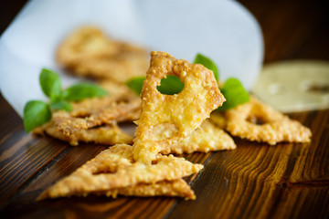 Home cheese crackers in the form of cheese
