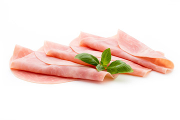 Thin slices of ham on white background.