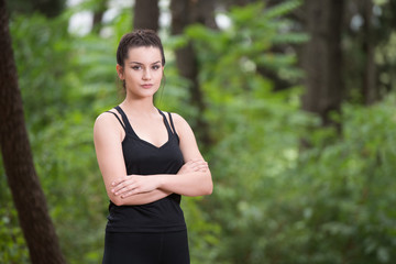 Portrait of a Fitness Woman Jogging Outdoors