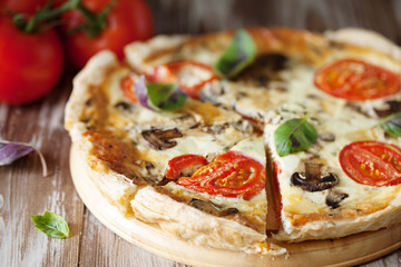 Homemade cheesy vegetable quiche pie