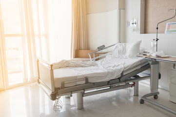 Soft focus background of electrical adjustable patient bed in hospital room - Powered by Adobe