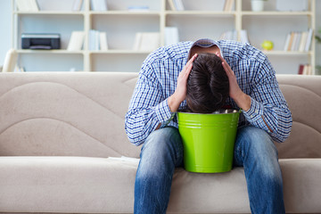 Man suffering from sick stomach and vomiting