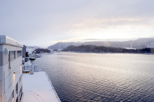 Sunrise at a fish processing plant in &Aring;lesund, Norway