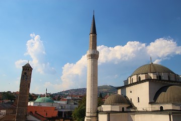 Fototapeta na wymiar Gazi Husrev-beg mosque and clock tower in the old town of Sarajevo, Bosnia and Herzegovina, South-Eastern Europe.