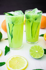 Refreshing drink with cucumber, lime and orange