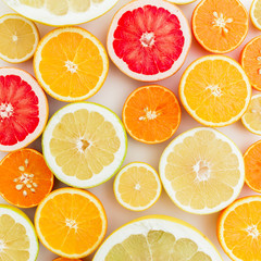 Lemon, orange, grapefruit, sweetie and pomelo on white background. Flat lay, top view.