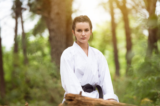 Woman Resting After Practicing Her Karate Moves