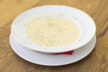 Delicious soup. Beautiful and tasty meal at the restaurant on a sunny day.