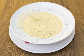 Delicious soup. Beautiful and tasty meal at the restaurant on a sunny day.