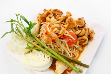 Papaya salad (somtum) with salted eggs and fried pork rind