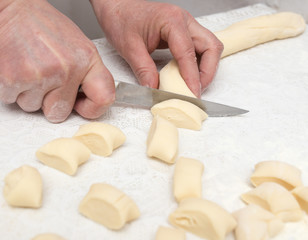 Cook cooks dough for pieces